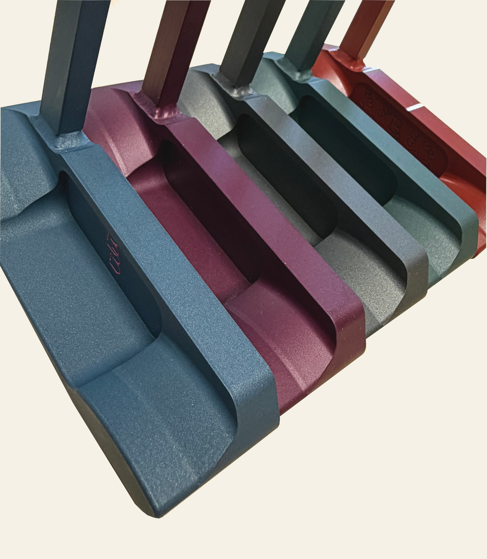 Bespoke putter range in blue, burgundy, silver, green and crimson finishes