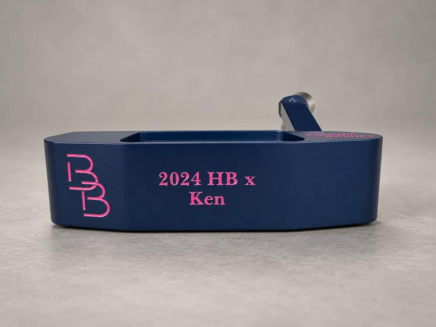Navy putter engraved 2024 HB x Ken with pink BB logo