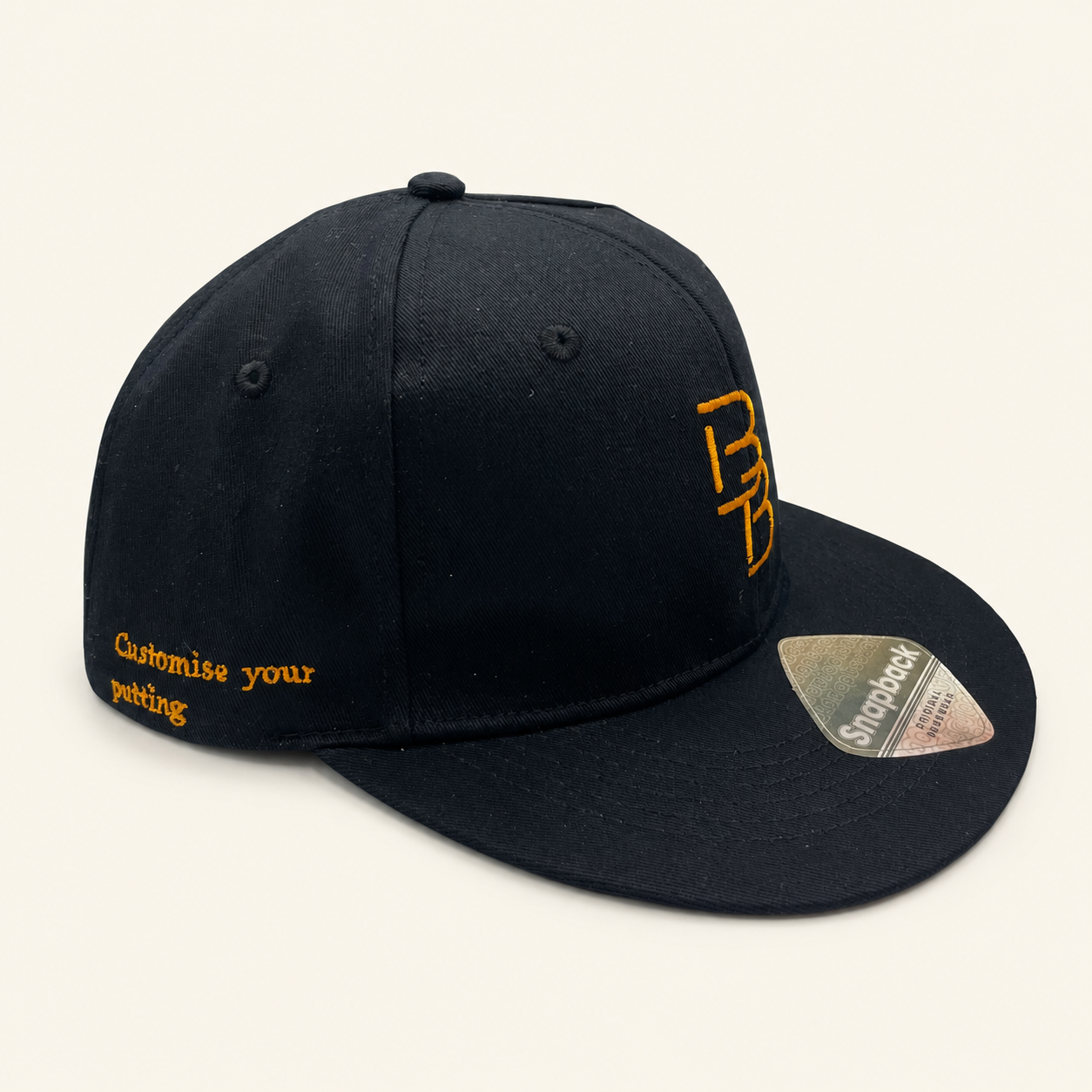 Bertie Boucher snapback cap with gold BB embroidery