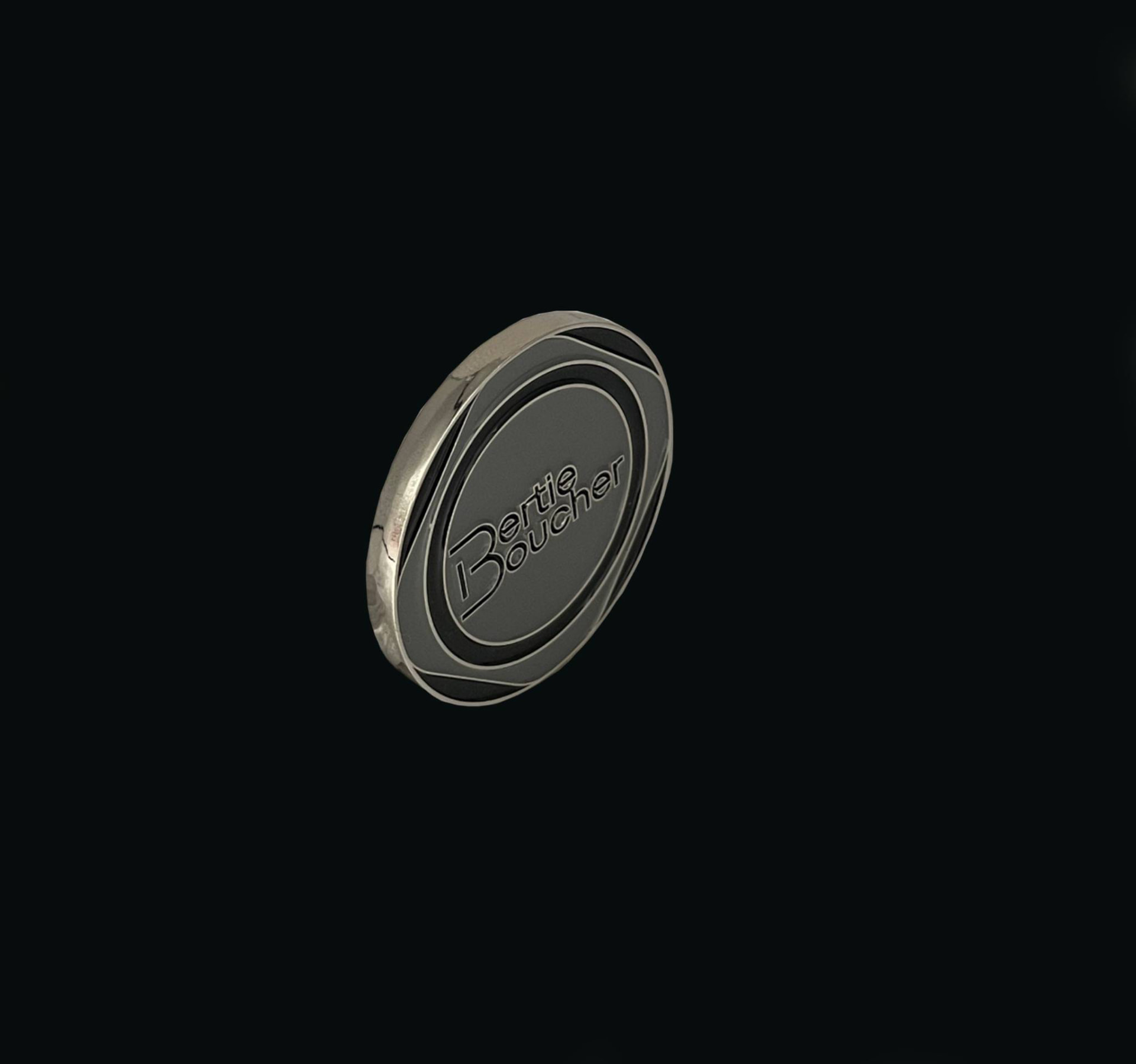Black and silver enamel ball marker with Bertie Boucher wordmark