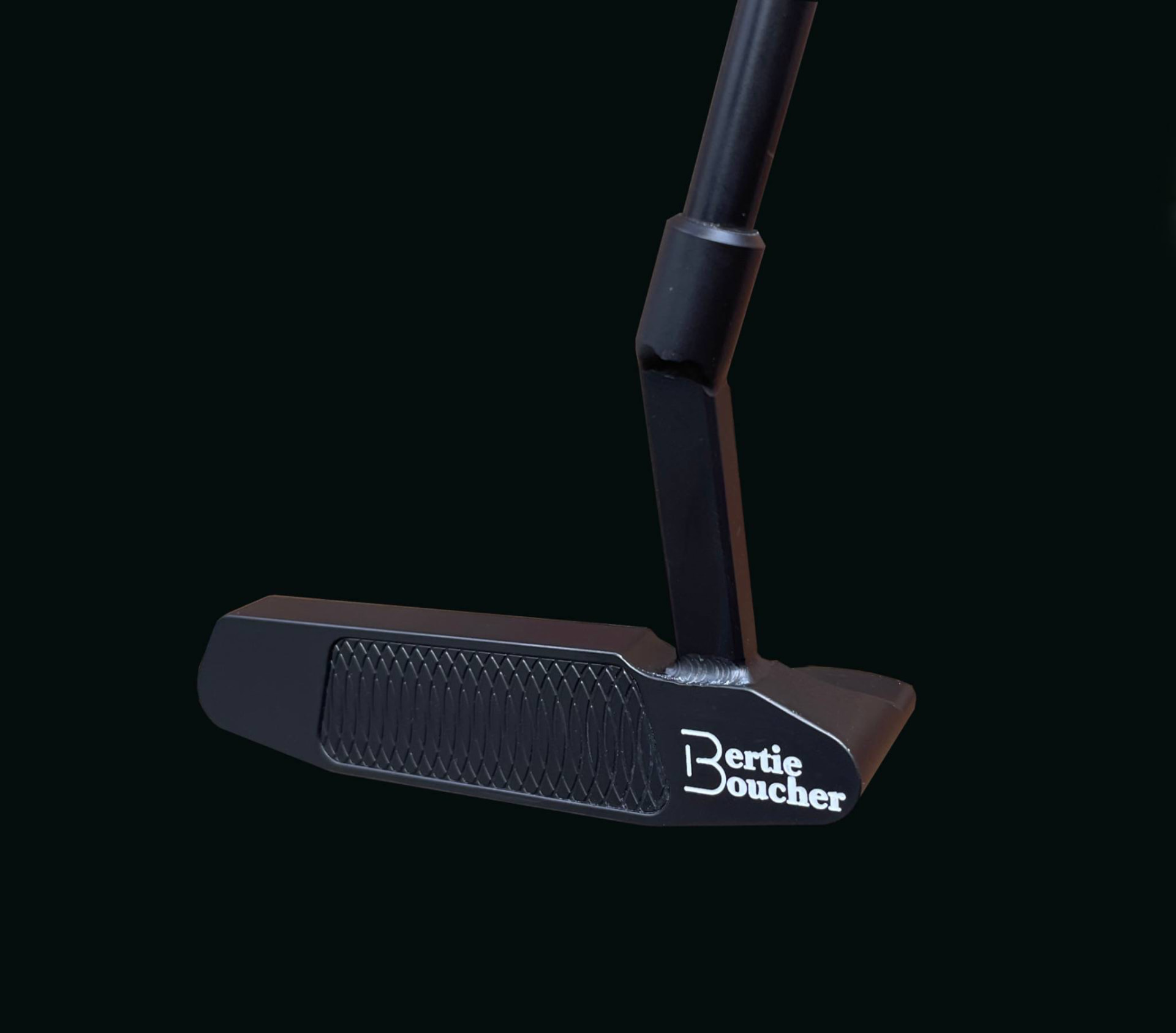Black Bertie Boucher blade putter shown from above with milled face insert